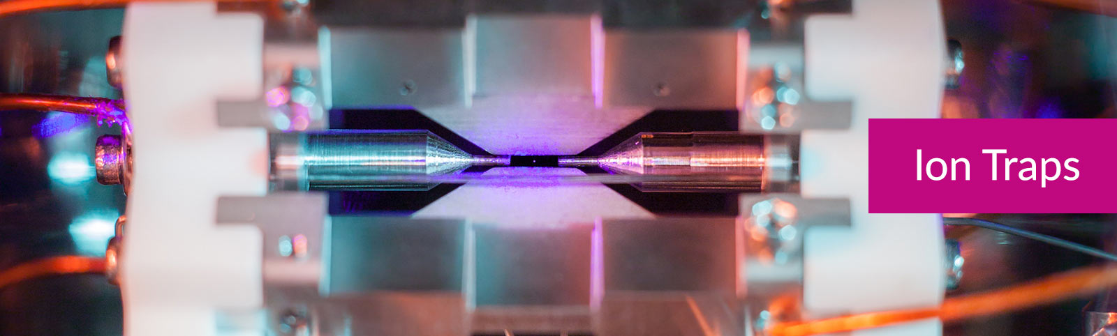 Ion traps banner showing a single atom held in an ion trap